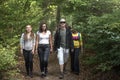 Team of active young people of boys and girls amicably walking a Royalty Free Stock Photo