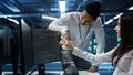 Team of admins in data center ensuring system can handle networking tasks Royalty Free Stock Photo