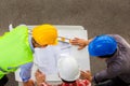 Team of Architect engineer planning group project partners meeting at building site, Construction site office teamwork concept Royalty Free Stock Photo