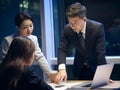 asian project team working late together meeting in office Royalty Free Stock Photo