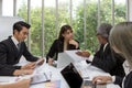 Team of asian business posing in meeting room. Working brainstorming at spacious board room at the office. asian people. Royalty Free Stock Photo