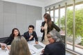 Team of asian business posing in meeting room. Working brainstorming at spacious board room at the office. asian people at office Royalty Free Stock Photo