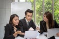 Team of asian business posing in meeting room. Working brainstorming at spacious board room at the office. asian people Royalty Free Stock Photo