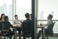 Team of asian corporate executives discussing business in conference room