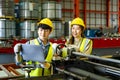 Team of Asian engineer worker inspecting inside the steel manufacturing factory while listening to manager advice on improvement Royalty Free Stock Photo