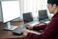 Team of asian programmer working together about new project to brainstorm and programming