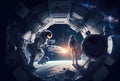 A team of astronauts traveling in space inside a spaceship with nebula in the background. Science and technology concept.