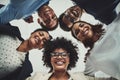 The team behind such great business success. Portrait of a group of businesspeople putting their heads together in a Royalty Free Stock Photo