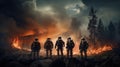 Team of brave firefighters while putting out a forest fire