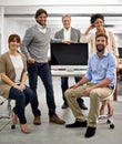 This team is brimming with positivity. Portrait of a group of dedicated and dynamic design professionals. Royalty Free Stock Photo