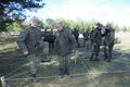 Team-building exercise: soldiers overcome an obstacle courses. Novo-Petrivtsi military base, Ukraine