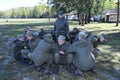 Team-building exercise: soldiers sitting on a ground and holding each other s hands. Novo-Petrivtsi military base, Ukraine