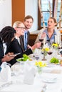 Team at business lunch meeting in restaurant Royalty Free Stock Photo