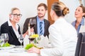 Team at business lunch meeting in restaurant Royalty Free Stock Photo