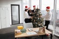 Team of business people celebrating new year in office with panoramic windows Royalty Free Stock Photo