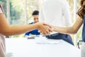 Team of business people negotiating an agreement closing the deal with handshake, Congratulations and Confirmation Royalty Free Stock Photo