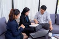 Team of business three people working together on a laptop with Royalty Free Stock Photo