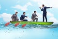 The team of businessmen in teamwork concept with boat Royalty Free Stock Photo