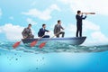 The team of businessmen in teamwork concept with boat Royalty Free Stock Photo