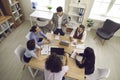 Team of business people having a discussion during a meeting around the office table Royalty Free Stock Photo