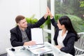 Team businesspeople hi five touching hand man and woman with smiling meeting for celebration at office