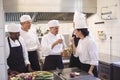 Team of chef tasting food in the commercial kitchen