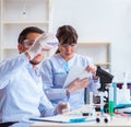 Team of chemists working in the lab Royalty Free Stock Photo