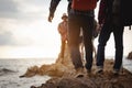 Team of climbers man and woman hiker hiking mountain climbing success stand at the cliff with backpacks on mountain top over. Royalty Free Stock Photo