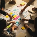 Team collaboration brainstorming session with colorful sticky notes Royalty Free Stock Photo