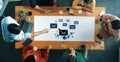 Team Collaboration and Strategy Session Around Table with Digital Communication and Email Concept Using Colorful Royalty Free Stock Photo