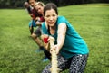 Team competing in tug of war