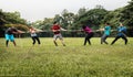 Team competing in tug of war