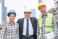 Asian supervisor and worker in the builder team