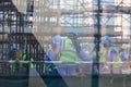 Team of construction worker on construction site. Royalty Free Stock Photo