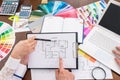 Team of creative designers discussing house plan in office Royalty Free Stock Photo