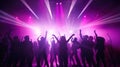 Team. A crowd of people in silhouette raises their hands on the dancefloor on neon light background. Night life, club, music, Royalty Free Stock Photo