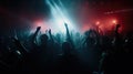 Team. A crowd of people in silhouette raises their hands on the dancefloor on neon light background. Night life, club, music, Royalty Free Stock Photo