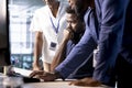 Team of data center software developers creating technical documentation