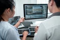 Team of Developer programmer working on coding program software computer in office, Writing website and development database Royalty Free Stock Photo
