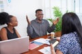 Team of diverse colleagues have heated discussion debate, boardroom table brainstorm Royalty Free Stock Photo