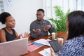 Team of diverse colleagues have heated discussion debate, boardroom table brainstorm Royalty Free Stock Photo