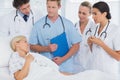 Team of doctors speaking to their patient Royalty Free Stock Photo