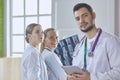 Team of doctors watching x-ray image in a hospital