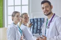 Team of doctors watching x-ray image in a hospital