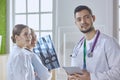 Team of doctors watching x-ray image in a hospital