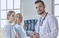 Team of doctors watching x-ray image in a hospital Royalty Free Stock Photo