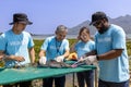 Team of ecologist volunteer pulling non biodegradable micro plastic from the endanger species fish due to the irresponsible waste