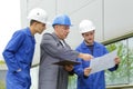 Team electricians at construction site