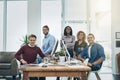The team that embodies their businesss brand. Portrait of a team of young go getters working in a modern office. Royalty Free Stock Photo