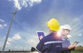 Team of Engineer people working in wind turbine and industrial with double exposure. Concept engineers